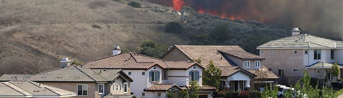 Fire approaching homes photo